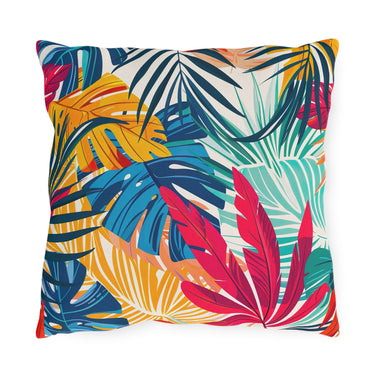 Colorful tropical leaf patterned pillow on a white background